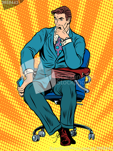 Image of thoughtful businessman sitting in chair