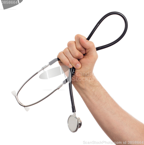 Image of Image of a medical doctor with a stethoscope in his hands isolat