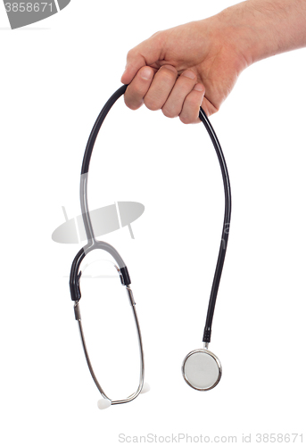 Image of Image of a medical doctor with a stethoscope in his hands isolat