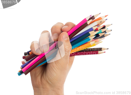 Image of Used pencils in hand isolated