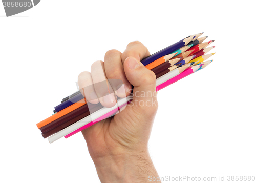 Image of Used pencils in hand isolated