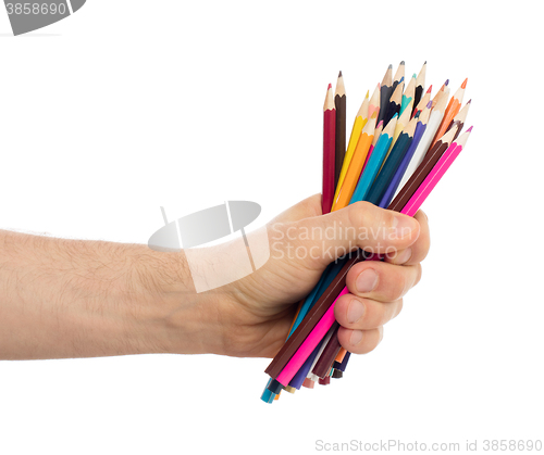 Image of Used pencils in hand isolated