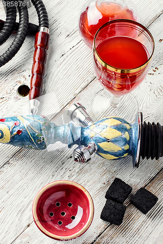 Image of Hookah and wine