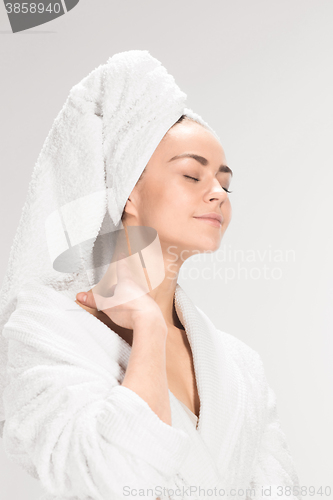 Image of The girl with a clean skin in bathroom