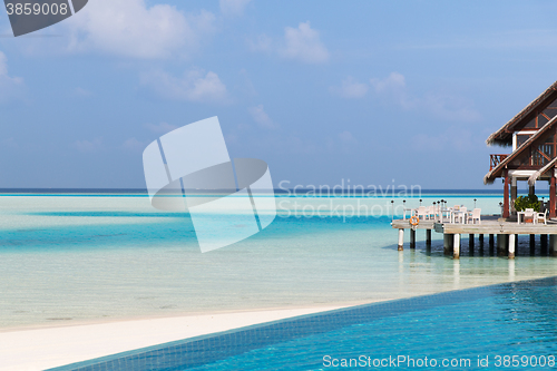 Image of patio or terrace with canopy on beach sea shore