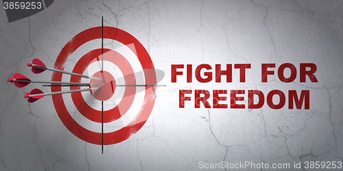 Image of Political concept: target and Fight For Freedom on wall background