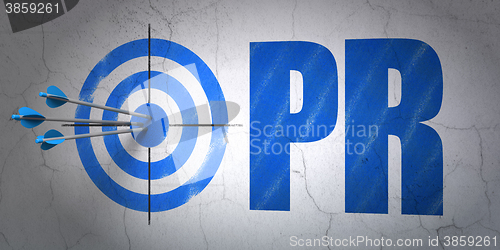 Image of Advertising concept: target and PR on wall background