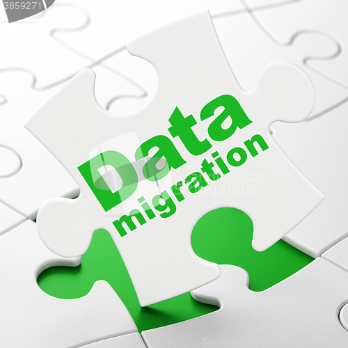 Image of Data concept: Data Migration on puzzle background