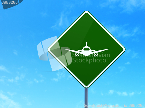 Image of Tourism concept: Aircraft on road sign background