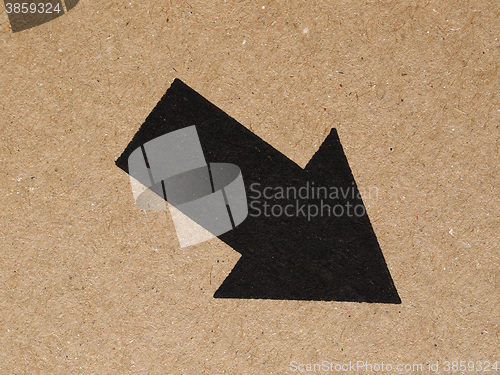 Image of Black arrow on cardboard