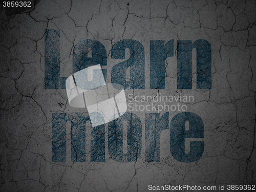 Image of Learning concept: Learn More on grunge wall background