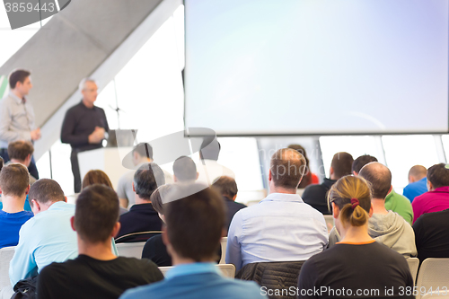 Image of Male speeker having talk at public event.