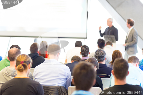 Image of Male speeker having talk at public event.