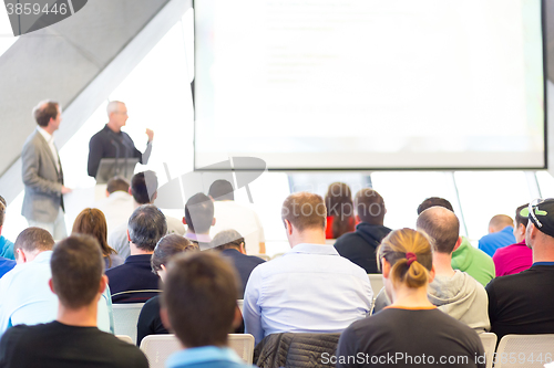 Image of Male speeker having talk at public event.