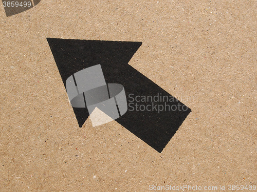 Image of Black arrow on cardboard