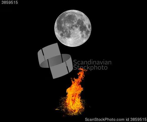 Image of Moon and bonfire in the night