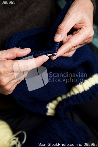 Image of Senior woman knitting
