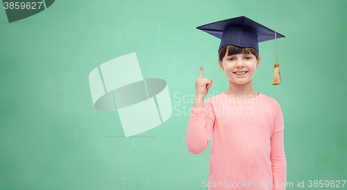 Image of happy girl in bachelor hat or mortarboard