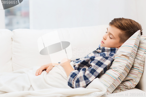 Image of little boy sleeping at home