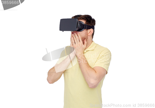 Image of happy man in virtual reality headset or 3d glasses