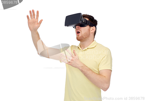 Image of happy man in virtual reality headset or 3d glasses