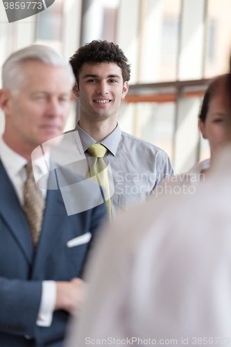 Image of portrait of young business man at modern office