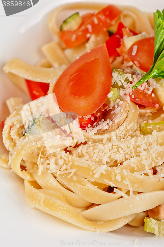 Image of Penne pasta with parmesan cheese