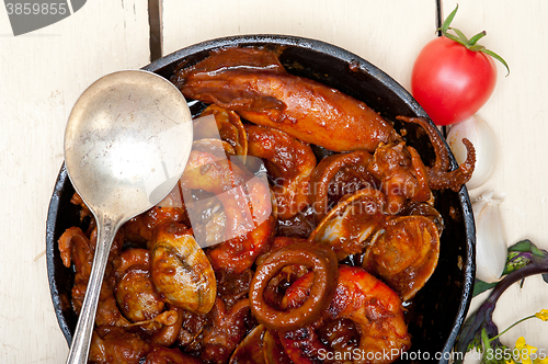 Image of fresh seafoos stew on an iron skillet