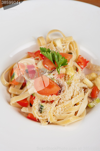 Image of Penne pasta with parmesan cheese