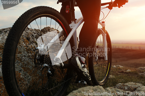 Image of Man cyclist riding the bicycle