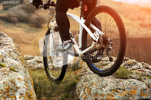 Image of Man cyclist riding the bicycle