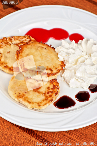 Image of Cheese pancakes with sour cream 
