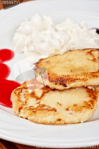 Image of Cheese pancakes with sour cream 