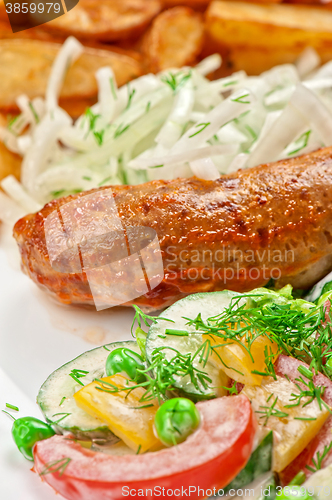 Image of Roasted sausage with vegetables 