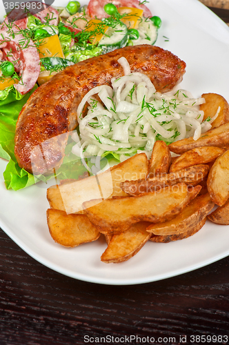 Image of Roasted sausage with vegetables 