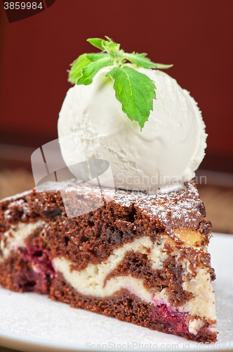 Image of chocolate cake with jam ice cream