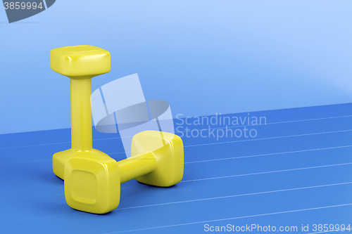 Image of Two yellow dumbbells