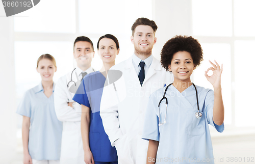 Image of group of happy doctors at hospital