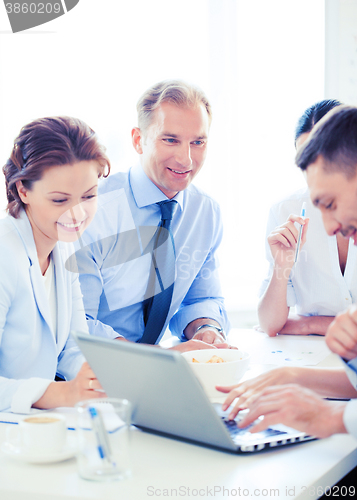 Image of businessman with team on meeting in office