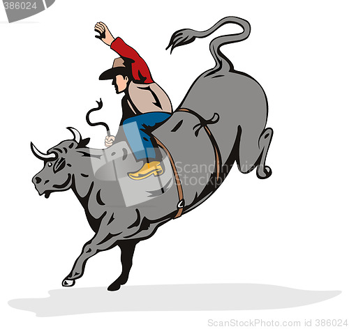 Image of Cowboy bull riding