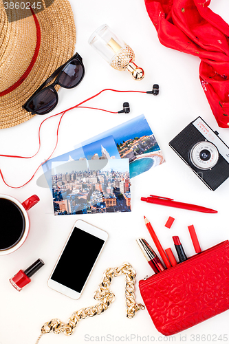 Image of The smart phone against fashion woman objects 