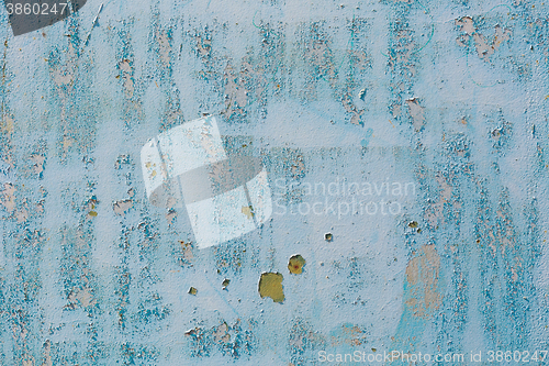 Image of Old blue cracked paint on metal background