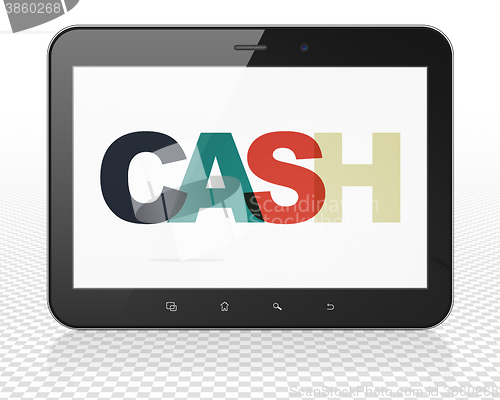 Image of Currency concept: Tablet Pc Computer with Cash on  display