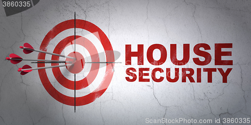 Image of Safety concept: target and House Security on wall background