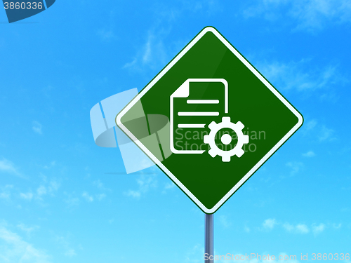 Image of Programming concept: Gear on road sign background