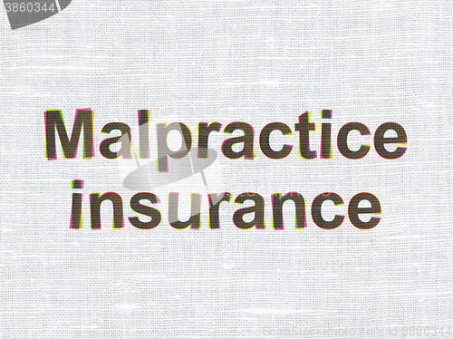 Image of Insurance concept: Malpractice Insurance on fabric texture background