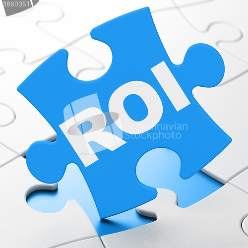 Image of Business concept: ROI on puzzle background