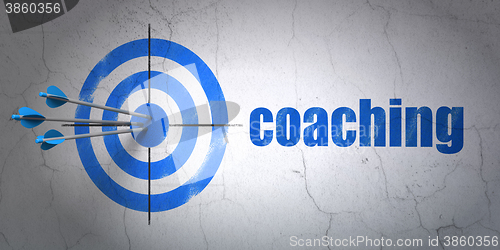 Image of Learning concept: target and Coaching on wall background