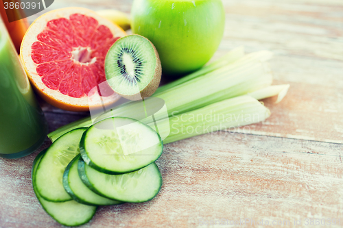 Image of close up of ripe fruits and vegetables on table