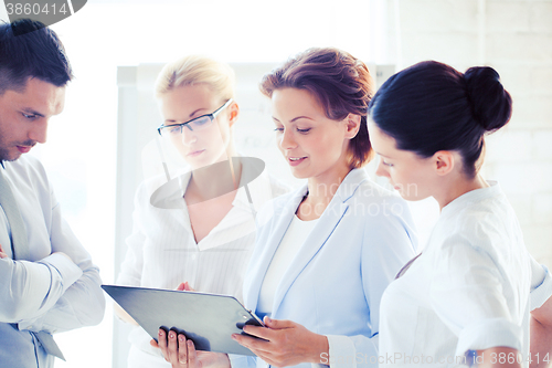 Image of business team having discussion in office